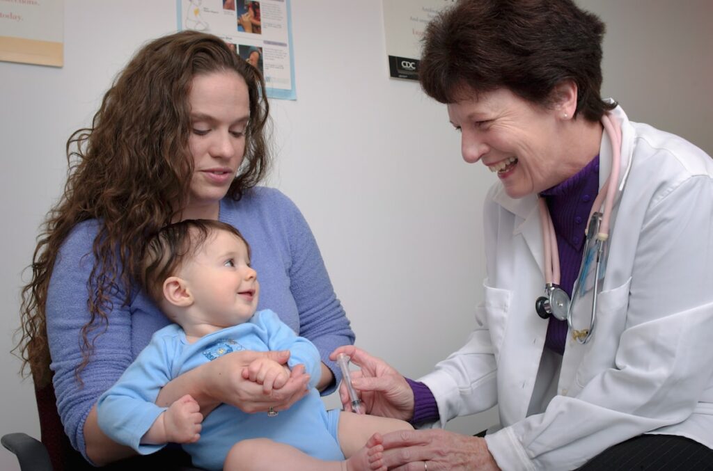 Infant receiving vaccination